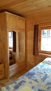Ένα ή περισσότερα κρεβάτια σε δωμάτιο στο Chalet Taffski