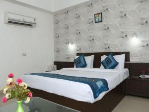 Voodi või voodid majutusasutuse Hotel Vikrant toas