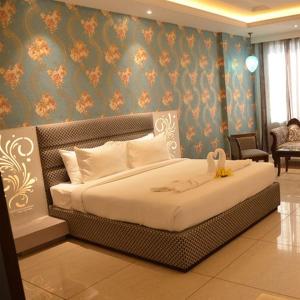 Hotel Vikrant 객실 침대