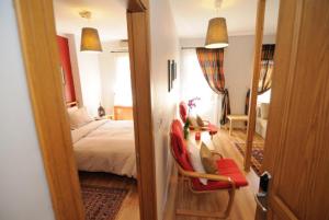 A bed or beds in a room at Ahmet Efendi Evi