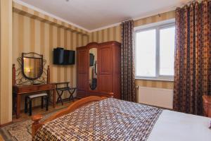 Voodi või voodid majutusasutuse Klassik Hotel toas