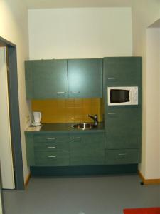 Kuchyň nebo kuchyňský kout v ubytování Haus Mobene - Hotel Garni