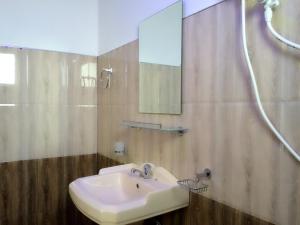 Koupelna v ubytování Thisara Guest House + 37 fotografií