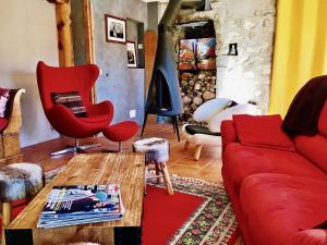 Posezení v ubytování Chambre d'Hôtes La Grange des Ecrins