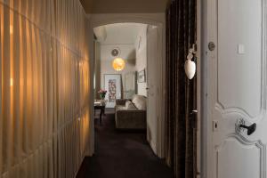Postel nebo postele na pokoji v ubytování Hôtel Particulier le 28