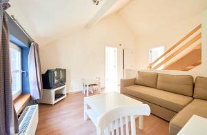 TV a/nebo společenská místnost v ubytování Holiday Home Beausoleil
