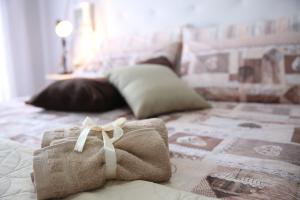 Säng eller sängar i ett rum på AmalfiCoastApartments
