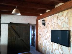 En TV eller et underholdningssystem på Casa rural el Carmen de la Sierra