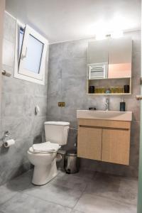 Et badeværelse på Gazi Divine Apartment