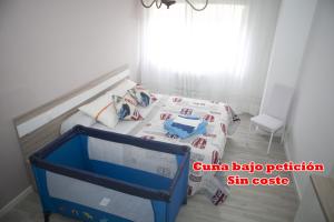 Posteľ alebo postele v izbe v ubytovaní El Apartamento de María