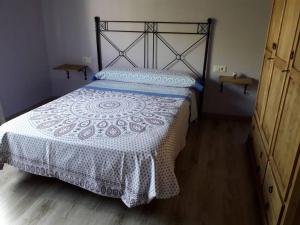 Postel nebo postele na pokoji v ubytování Cortijo de los geraneos