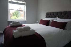 Giường trong phòng chung tại 3 Summertown Court
