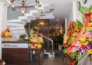a flower shop with flowers on display in a building at Kha Hostel in Hue