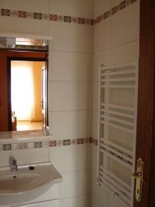 A bathroom at Horváth Vendégház