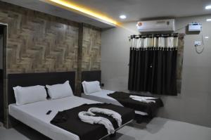Postel nebo postele na pokoji v ubytování Hotel SAARA