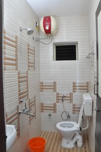 Koupelna v ubytování Hotel SAARA + 37 fotografií
