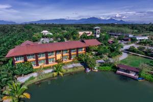 an aerial view of a resort on the water at Tamali Hotel in Nakhon Si Thammarat