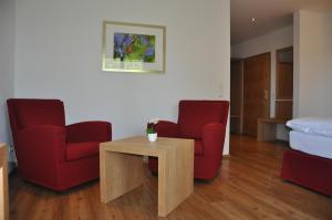Posezení v ubytování Hotel Gasthof Moosleitner