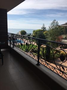 a balcony with a view of the ocean at Rich-3 SP apartments in Ravda