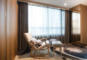 Ruang duduk di Home Hotel