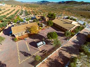 an aerial view of a small town in the desert at Complejo Rural La Tejera in Elche de la Sierra