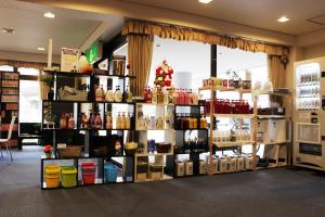 a store with a lot of products on shelves at Hotel Higashihiroshima Hills Saijo in Higashihiroshima
