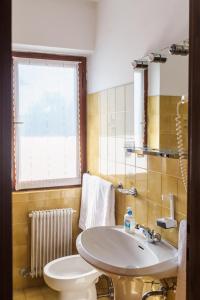 Koupelna v ubytování Hotel Mignon