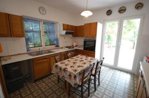 Kuchyň nebo kuchyňský kout v ubytování Apartment Mlađan by El-Pi Tours