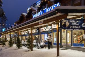 a store front of a store in the snow at Zone Apartments in Ruka