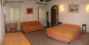 Postel nebo postele na pokoji v ubytování Ciprea Rooms + 5 fotografií