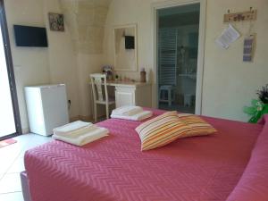 Posteľ alebo postele v izbe v ubytovaní B&B Demetra