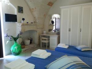 Posteľ alebo postele v izbe v ubytovaní B&B Demetra