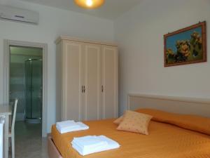 Posteľ alebo postele v izbe v ubytovaní B&B Demetra