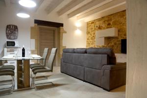 Et opholdsområde på Appartamenti Maniace