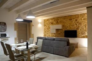 Et tv og/eller underholdning på Appartamenti Maniace