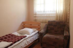Postel nebo postele na pokoji v ubytování Hotel Restaurant Kakhaberi