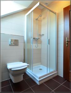Koupelna v ubytování Hotel Tacl