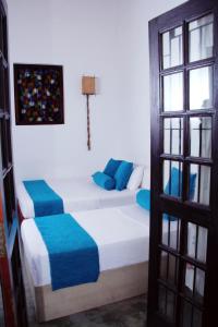 Katil atau katil-katil dalam bilik di Bethel Rest Homestay