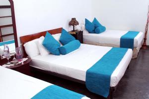 Katil atau katil-katil dalam bilik di Bethel Rest Homestay