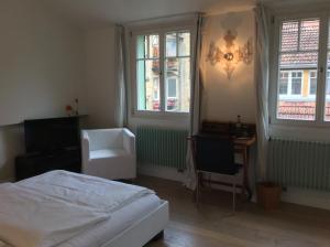 Postel nebo postele na pokoji v ubytování Hotel Heidelberg Astoria