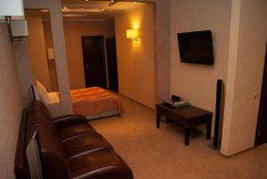 Katil atau katil-katil dalam bilik di Bogemia City Hotel
