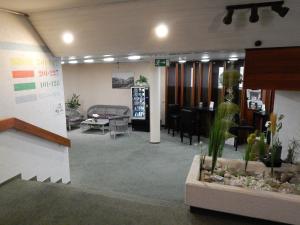 a lobby of a store with a table and chairs at FREE Apartment - Bei den Thermen in Bad Urach