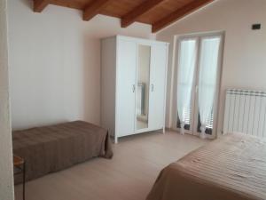 A bed or beds in a room at casa stefania