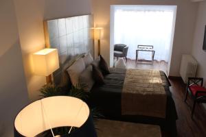 Posezení v ubytování Résidence et Chambres d'Hôtes de La Porte d'Arras