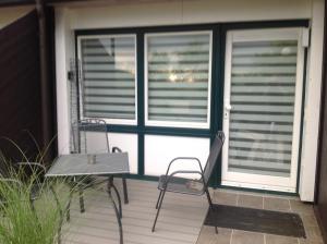 Rõdu või terrass majutusasutuses Ferienwohnung Sasbachwalden H15 Ap6 mit beheiztem Innenpool und Sauna