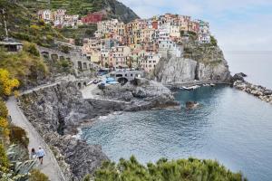a view of the amalfi coast with houses at Splendido, A Belmond Hotel, Portofino in Portofino