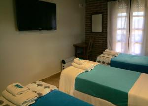 Katil atau katil-katil dalam bilik di Hotel Berlin Pinamar