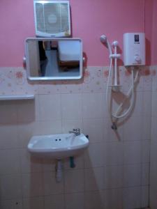 Ett badrum på Sakthong Resort