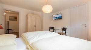Ein Bett oder Betten in einem Zimmer der Unterkunft Haus Kissel