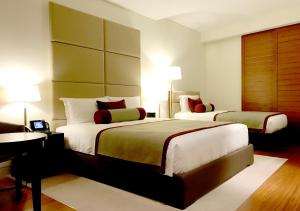 Katil atau katil-katil dalam bilik di Oryx Airport Hotel -Transit Only